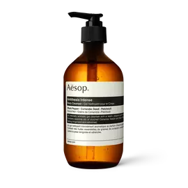 Aesop Antithesis Intense Body Cleanser pump bottle on a light background.